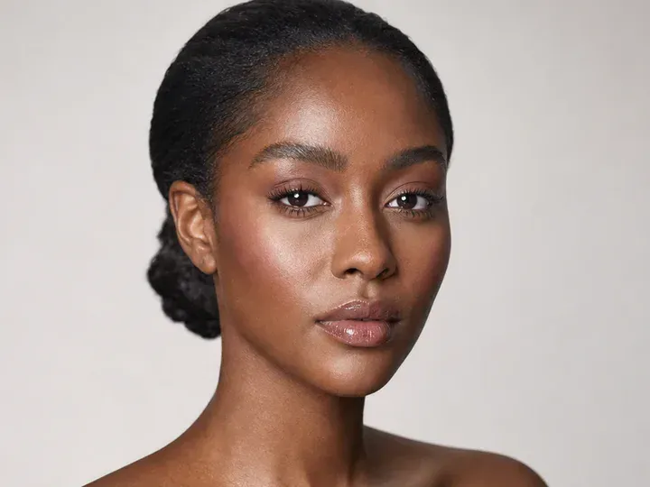 Step 1 of Wearable Clean Makeup Look, showing the skin and lids feel settled, even, and ready for thin layers without a slippery surface.