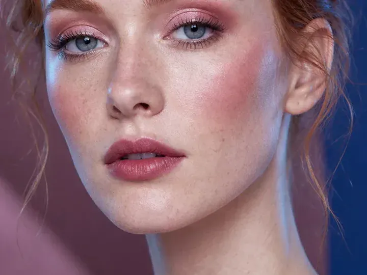 Step 1 of Cool Rosy Makeup for Fair Skin, showing the skin and lids feel settled, even, and ready for thin layers without a slippery surface.