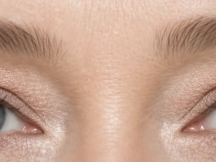 Step 1 of Balanced Eye Makeup for Close-Set Eyes, showing the lids feel smooth and dry while the natural fold and open-eye landmarks remain easy to see.