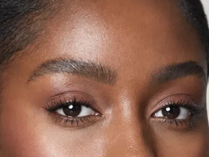 Step 3 of Wearable Clean Makeup Look, showing the brows look intentional but retain visible hairs and enough softness for the rest of the look.
