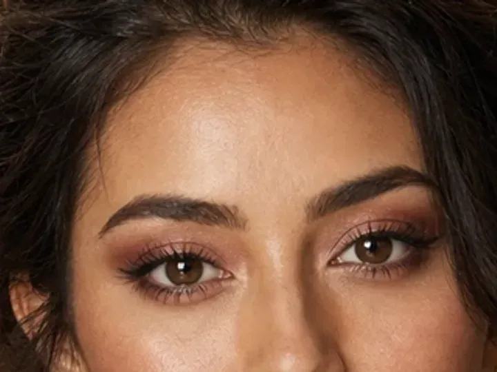 Step 3 of Soft Glam Wedding Guest Makeup, showing the brows look intentional but retain visible hairs and enough softness for the rest of the look.