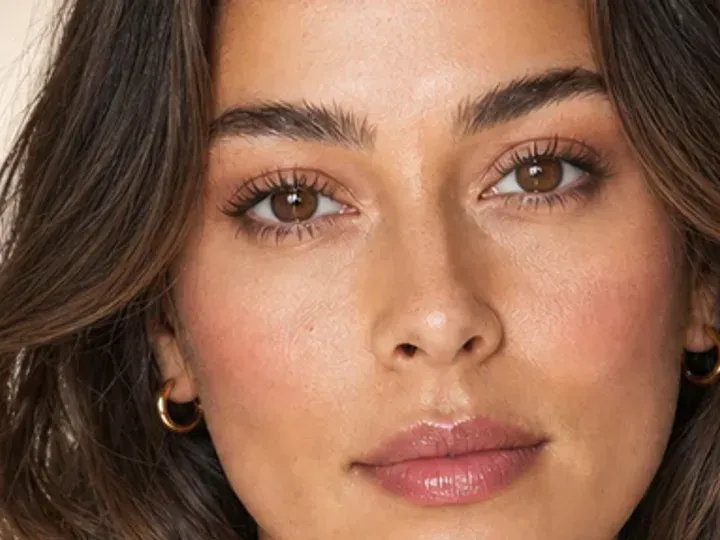Step 4 of 5-Minute Everyday Makeup, showing skin-tone taupe establishes the eye direction at lid and crease without a hard outer edge.