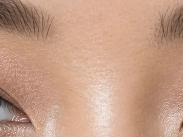 Step 4 of Lifted Makeup for Downturned Eyes, showing satin beige is clearly visible at inner and center lid while the transition border stays intact.