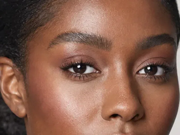 Step 4 of Wearable Clean Makeup Look, showing neutral tan establishes the eye direction at lid and upper crease edge without a hard outer edge.