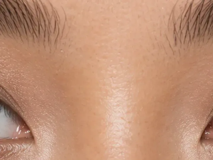 Step 4 of Elongated Eye Makeup for Round Eyes, showing soft bronze is clearly visible at center to outer lid while the transition border stays intact.