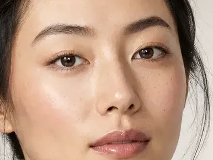 Step 4 of Natural No-Makeup Makeup, showing skin-shadow taupe establishes the eye direction at lash line and crease edge without a hard outer edge.