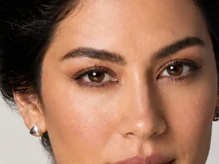 Step 4 of Natural Job Interview Makeup, showing neutral taupe establishes the eye direction at lid and crease without a hard outer edge.