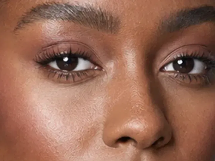 Step 5 of Wearable Clean Makeup Look, showing soft espresso makes the lashes look denser while the eye color and lid space stay visible.