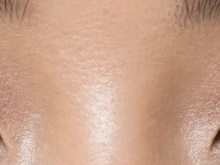 Step 5 of Lifted Makeup for Downturned Eyes, showing deep cocoa makes the upper lashes look denser without hiding the focal lid shade.