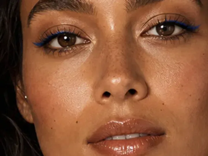Step 5 of Easy Vacation Makeup, showing espresso makes the lashes look denser while the eye color and lid space stay visible.