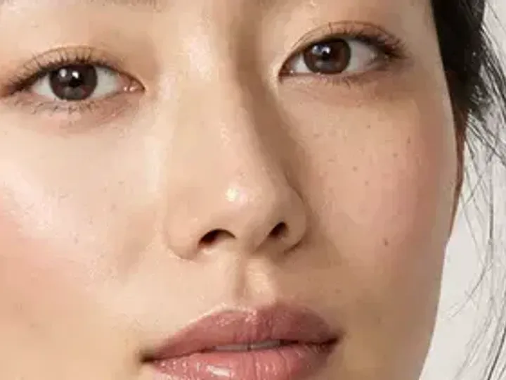 Step 5 of Natural No-Makeup Makeup, showing skin-shadow taupe makes the lashes look denser while the eye color and lid space stay visible.