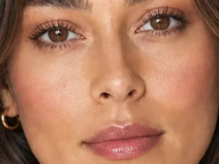 Step 5 of 5-Minute Everyday Makeup, showing soft brown makes the lashes look denser while the eye color and lid space stay visible.