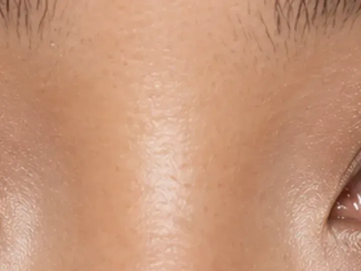 Step 5 of Elongated Eye Makeup for Round Eyes, showing deep brown makes the upper lashes look denser without hiding the focal lid shade.
