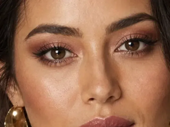 Step 5 of Soft Glam Wedding Guest Makeup, showing soft berry makes the lashes look denser while the eye color and lid space stay visible.