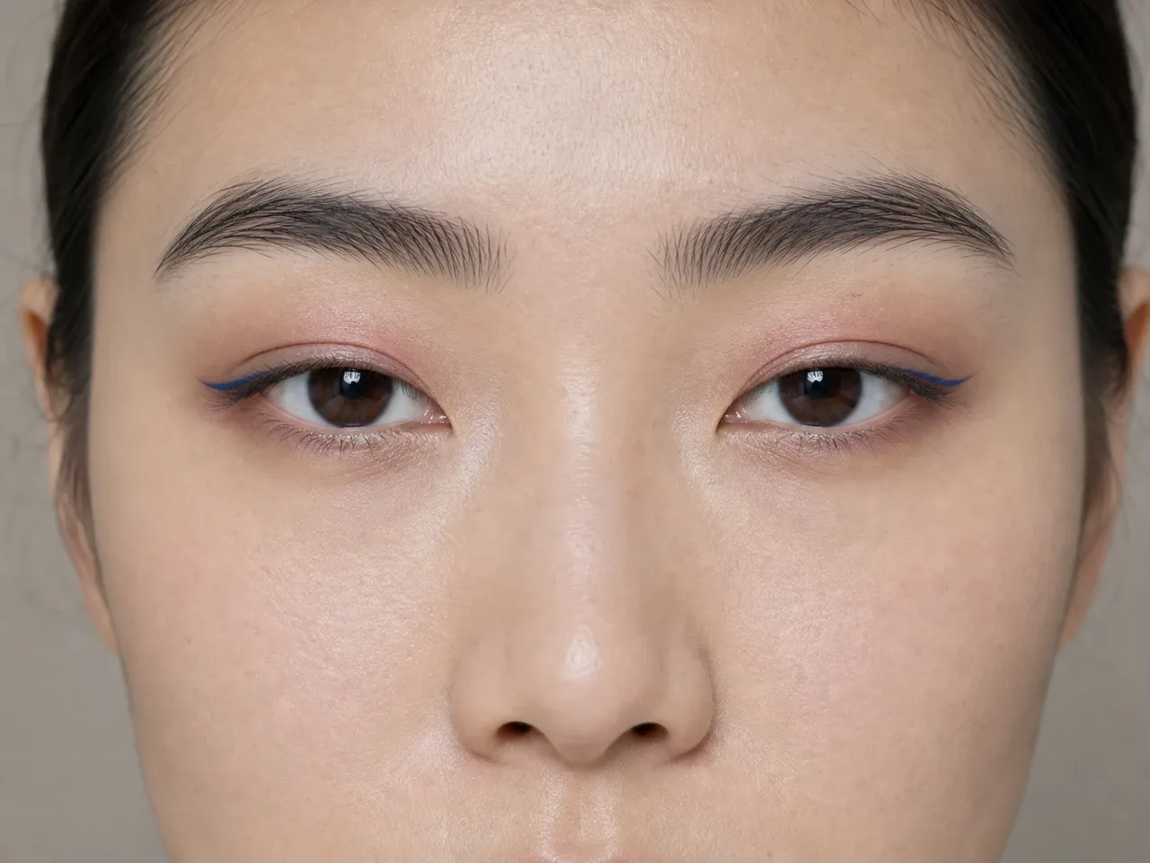 Step 6 of Soft Glam for Hooded Eyes, showing a restrained lower-lash echo connects the palette without closing the inner corner or pulling the eye down.