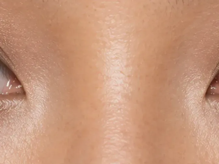 Step 6 of Elongated Eye Makeup for Round Eyes, showing a restrained lower-lash echo connects the palette without closing the inner corner or pulling the eye down.