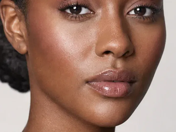 Step 6 of Wearable Clean Makeup Look, showing clear rose is visible at upper outer cheek while natural skin still shows through the edges.