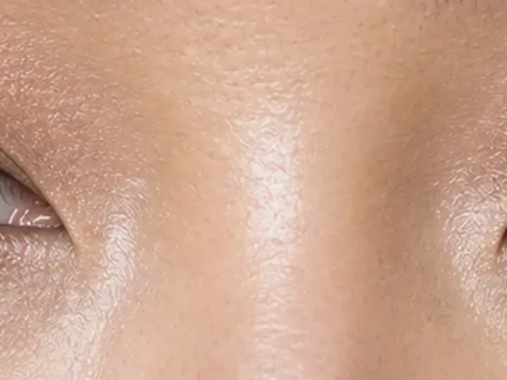 Step 6 of Lifted Makeup for Downturned Eyes, showing a restrained lower-lash echo connects the palette without closing the inner corner or pulling the eye down.