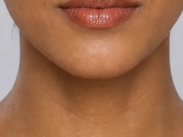 Step 7 of Warm Bronze Makeup for Medium Skin, showing the lip supports Terracotta rose and the warm satin finish without becoming the only focal point.