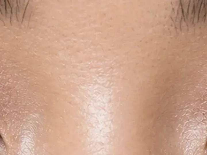 Step 7 of Lifted Makeup for Downturned Eyes, showing the center and outer lashes lift clear of the lid and remain individually separated.