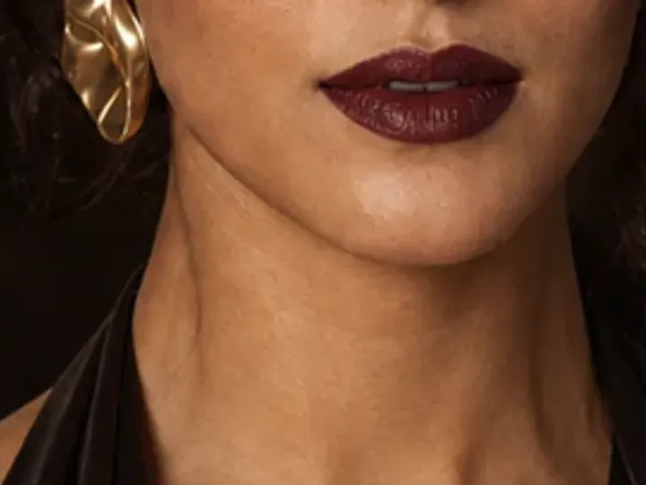 Step 7 of Elegant Dinner Party Makeup, showing the lip supports Muted wine and the velvet satin finish without becoming the only focal point.
