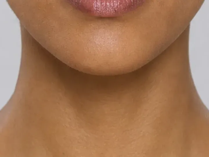 Step 7 of Neutral Soft Glam for Olive Skin, showing the lip supports Mauve brown and the neutral satin finish without becoming the only focal point.