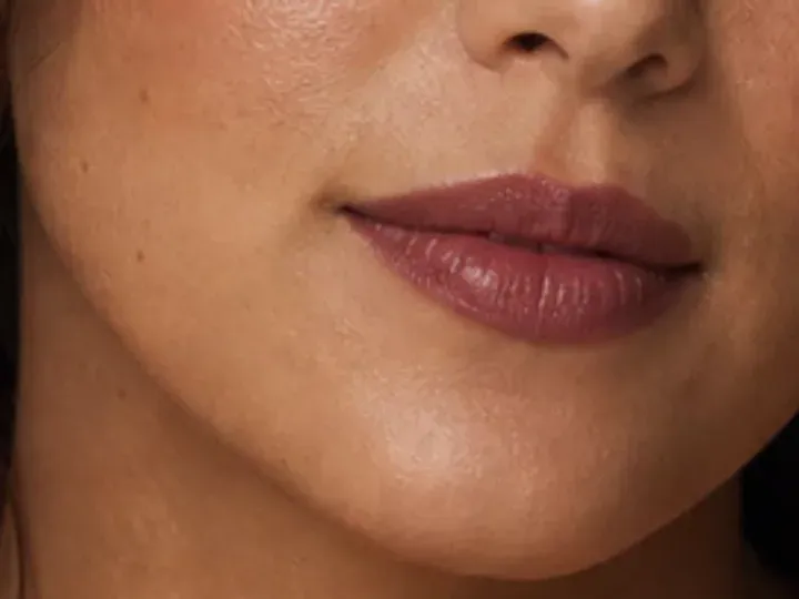 Step 7 of Easy Date Night Makeup, showing the lip supports Tea rose and the luminous finish without becoming the only focal point.