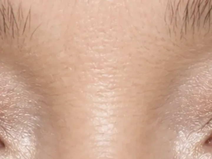 Step 7 of Balanced Eye Makeup for Close-Set Eyes, showing the center and outer lashes lift clear of the lid and remain individually separated.