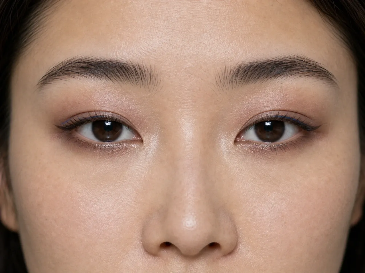 Step 8 of Soft Glam for Hooded Eyes, showing the soft satin eye reads evenly from straight ahead and every focal area remains visible with a relaxed gaze.