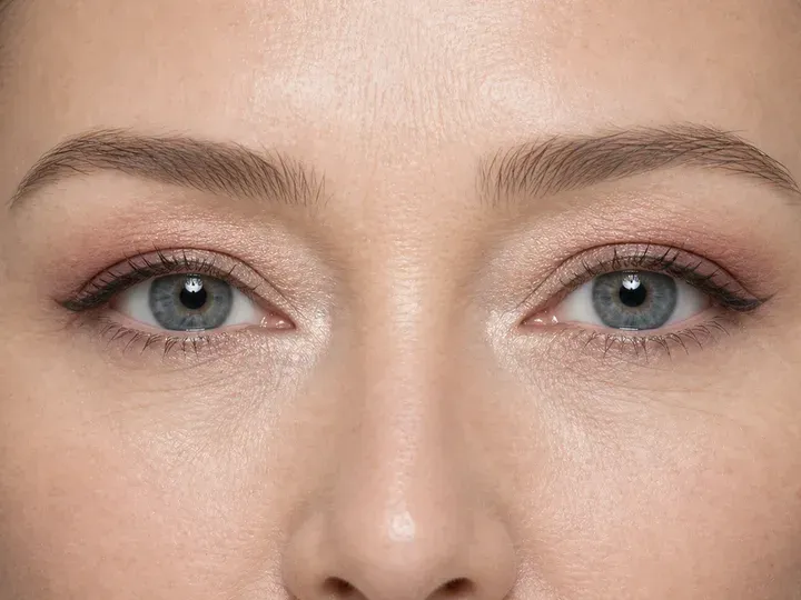 Step 8 of Balanced Eye Makeup for Close-Set Eyes, showing the bright satin eye reads evenly from straight ahead and every focal area remains visible with a relaxed gaze.